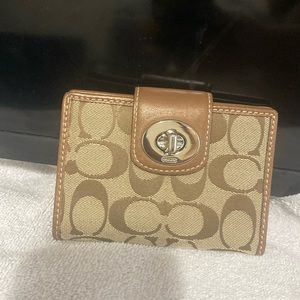Coach Bifold Brown Monogram Wallet, no call outs in good condition, kiss lock